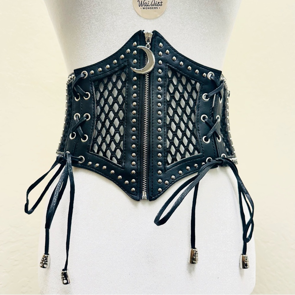 Black lace up corset with zipper and lace up back, featuring a moon charm
